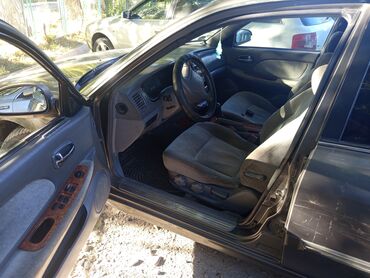 автомобиль с последующим выкупом: Kia : 1999 г., 2 л, Механика, Бензин