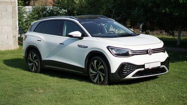 электромобили из китая: Электрический внедорожник Volkswagen ID.6 в белом цвете с черной