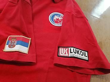 pull and bear turkey: Crvena polo majica sa kratkim rukavima i kragnom na tri dugmeta. Na — 4