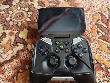 nvidia geforce rtx 5090: NVIDIA SHIELD Portable (модель P2450) - Портативная и гровая консоль — 4