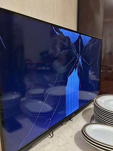 tv box android: TCL smart televizor (təqr. 43–50 düym arası, nazik çərçivəli, iki — 2