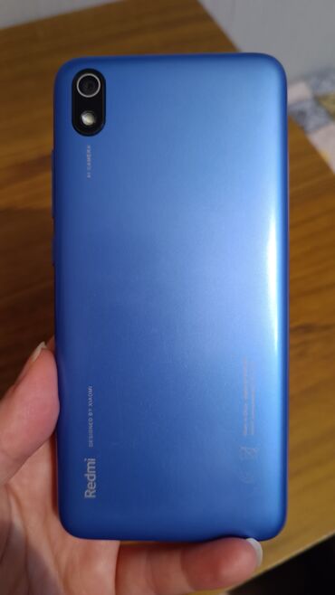 xiaomi redmi b u: Xiaomi Redmi 7A, 32 ГБ, цвет - Синий, 
 Сенсорный, Две SIM карты, Face ID
