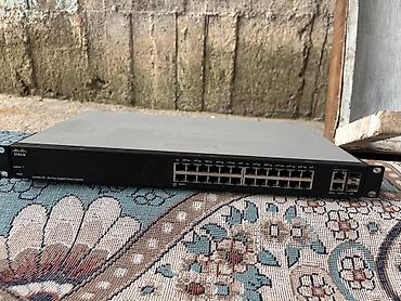 коммутаторы 24: Cisco SG200-26 Gigabit Smart Switch (модель SSG200-26) - 26-портовый — 1