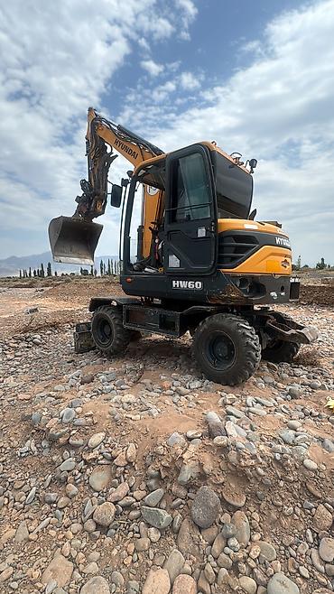 мини погрузчик bobcat цена: Экскаватор, Hyundai, Колесный — 6