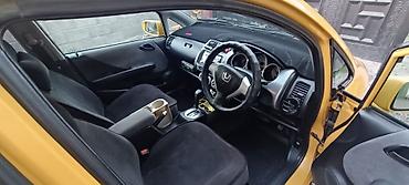 mazda 3 2005: Honda Fit: 2004 г., 1.3 л, Вариатор, Бензин, Хэтчбэк — 10