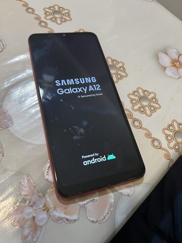 Samsung: Samsung Galaxy A12, rəng - Qırmızı, Qırıq, Barmaq izi, İki sim kartlı