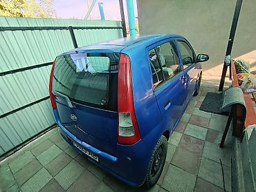 авто бак: Daihatsu Cuore: 2003 г., Механика, Бензин, Хэтчбэк — 4