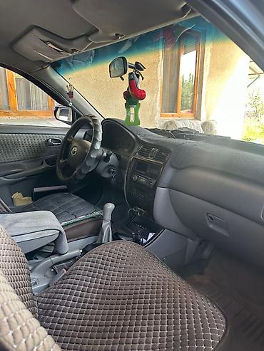Унаа сатуу: Mazda 626: 2000 г., 2 л, Кол менен иштөөчү, Бензин, Хетчбек — 5