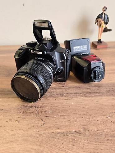 Фотоаппараттар: Зеркальный фотоаппарат Canon EOS 1000D Kit 18-55мм — отличный старт — 1
