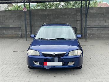e53 amg: Mazda 323: 2002 г., 1.6 л, Механика, Бензин, Хэтчбэк — 1