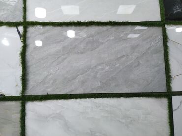 metlax qiymeti: Mərmər naxışlı, hamar səthli divar və döşəmə kafelləri təklif olunur