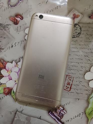 isdenmis telefonlar: Redmi 4A, 16 GB, rəng - Qızılı, İki sim kartlı — 2
