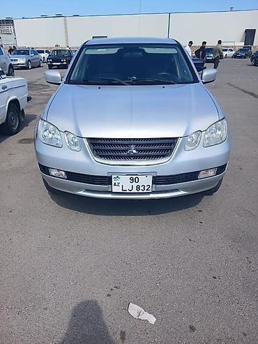 Mitsubishi: Mitsubishi Airtrek, gümüşü rəng, 5 qapılı krossover/gəzinti — 1