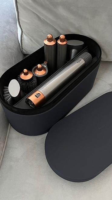 Dyson Airwrap в серо-золотом цвете. В комплекте стайлер, насадки и