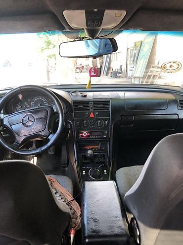 mercedes c203: Mercedes-Benz C 230: 2.3 l | 1995 il Sedan — 1