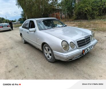 арзан машина мерс: Mercedes-Benz E‑Class (W210) седан, серебристый цвет кузова. вложение