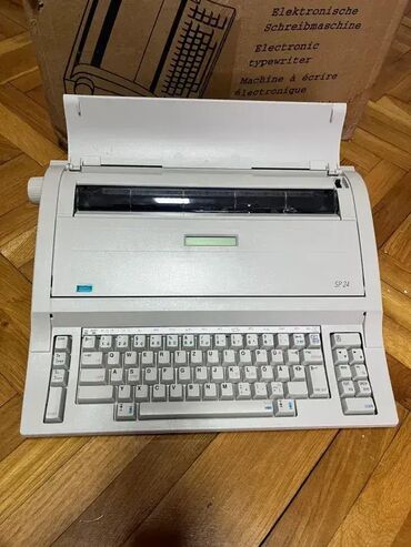 Stari uređaji: *** SUPER AKCIJA *** #2782 Elektronska pisaća mašina Optima SP 24; — 4