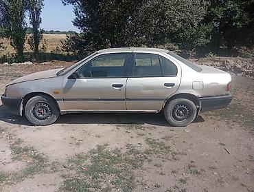 235 65: Nissan Primera: 1991 г., 1.6 л, Механика, Бензин, Седан — 5