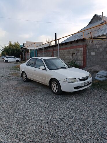 мазда 9: Mazda Familia: 2001 г., 1.5 л, Автомат, Газ, Седан