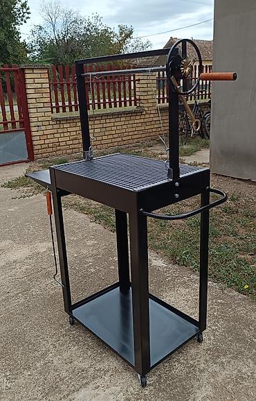 Sve za roštilj: Podesivi roštilj u dimenziji rešetke 65x45 cm Rešetka je izrađena od — 6