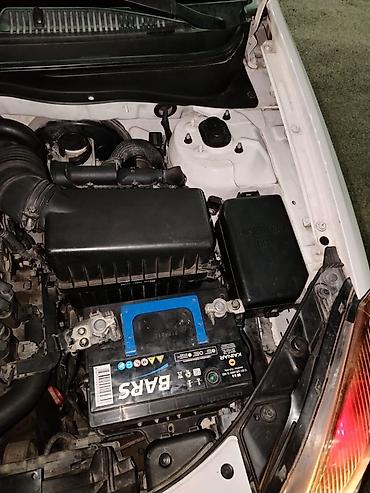 Kia: Kia Rio: 1.4 l | 2010 il Sedan — 18