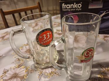 Digər dəstlər və servizlər: Şüşə qab dəsti - 2 ədəd şüşə krujka: qalın divarlı, qulpulu. Üzərində — 1