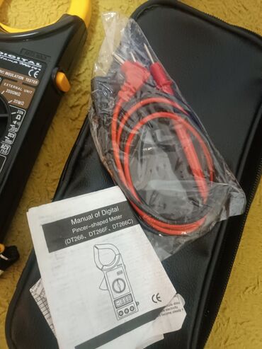 Multimetri: Digitalne strujne klešta/multimetar DT-266 Opis: - Digitalni clamp — 7