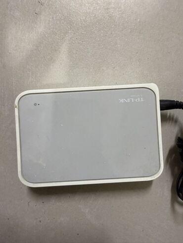 комплекты: Пятипортовый настольный коммутатор TP-Link TL-SF1005D в белом корпусе