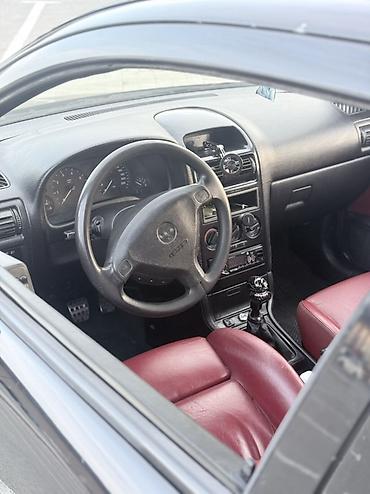 Opel: Model: Opel Astra G Coupe (3 qapı) Rəng: qara Kuzov: hetçbek/kupeli 3 — 6