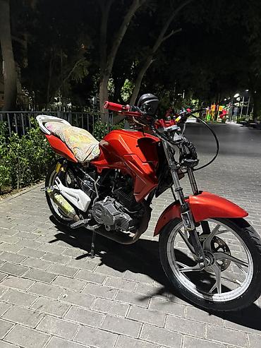 2 el motor: Qırmızı rəngli şəhər tipli motosiklet Texniki xüsusiyyətlər və — 2