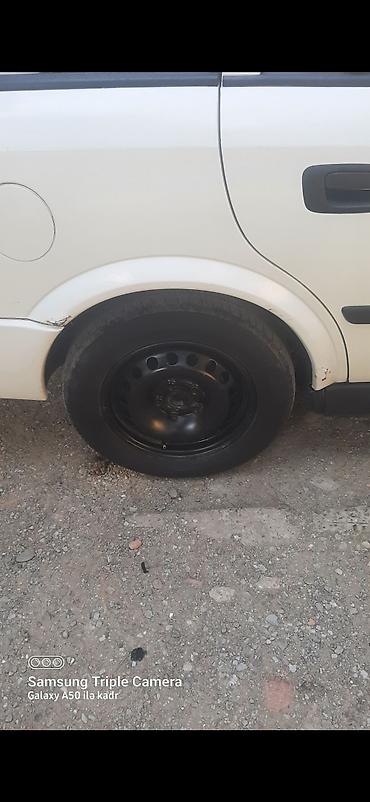 opel difuzer: Opel Astra Universal – ağ rəng Xüsusiyyətlər: - Kuzov: universal — 7
