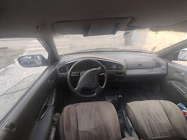 Унаа сатуу: Mazda 323: 1996 г., 1.8 л, Кол менен иштөөчү, Бензин, Седан — 7