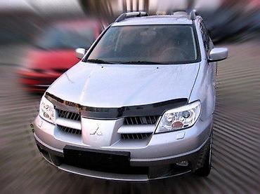 DEFLEKTOR STITNIK HAUBE MITSUBISHI OUTLANDER (2002+) | Deflektor na lalafo.rs DEFLEKTOR STITNIK HAUBE MITSUBISHI OUTLANDER (2002+) | Deflektor