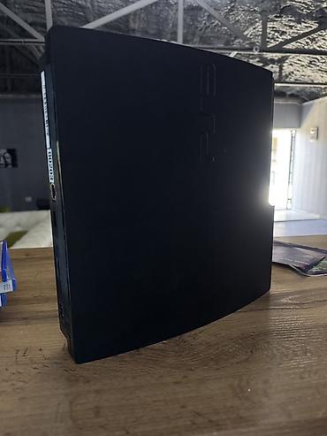 сони тройка: Игровая приставка Sony PlayStation 3 Slim (чёрная)+Джостик 2 шт — 1