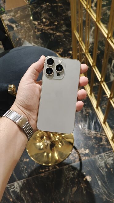 iphone x qiymeti irsad: IPhone 15 Pro, 64 GB, Matte Gold, Face ID