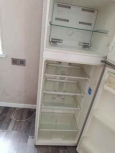 maqnitafon satisi: Beko iki qapılı soyuducu - Üst hissədə dondurucu bölmə, şüşə rafla - — 1
