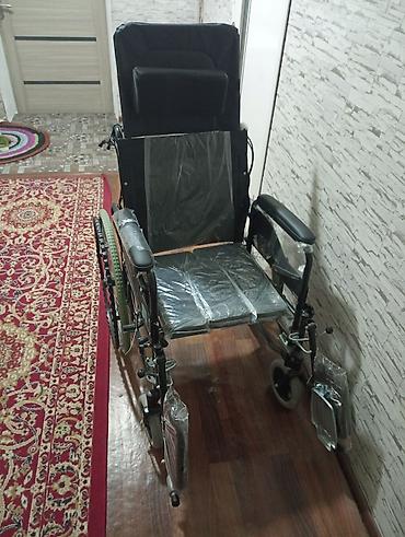 Инвалидная коляска с высоким спинным модулем и подголовником