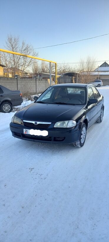 mazda mx5: Mazda 323: 2002 г., 1.6 л, Автомат, Бензин, Седан