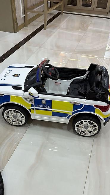 Uşaq üçün elektrik maşınları: Uşaq üçün elektrikli polis maşını - Dizayn: Ağ rəngli kuzov — 2