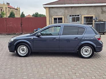 235 55 17: Opel Astra: 1.4 l | 2009 il 193000 km Hetçbek — 6