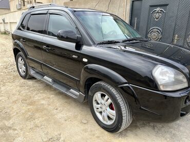 Hyundai: Hyundai Tucson: 2 l | 2005 il Ofrouder/SUV — 2