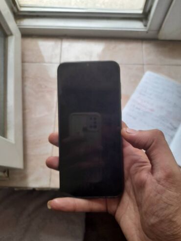 Galaxy A14 yaxsi veziyyetdedi. Karobkasi yoxdu