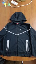 фирменные часы: Эркектердин спорттук костюму, L, Nike, Колдонулган, түсү - Кара, Өзү алып кетүү, Акылуу жеткирүү