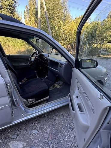 кобальт продажа: Mazda Demio: 1998 г., 1.3 л, Механика, Бензин, Хэтчбэк — 6