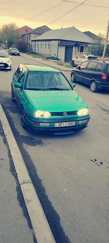 sport sukan: Volkswagen Golf 3, 5 qapı, yaşıl rəng. - Motor: benzin, 4 silindr — 1