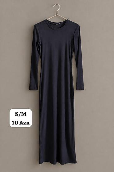 Qara rəngli uzun don - Model: minimalistik, düz kəsim - Uzunluq: maxi