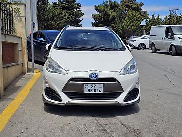 prius spoyler: Toyota Aqua Hybrid, ağ rəng, hetçbek gövdə. Əsas xüsusiyyətlər: - — 1