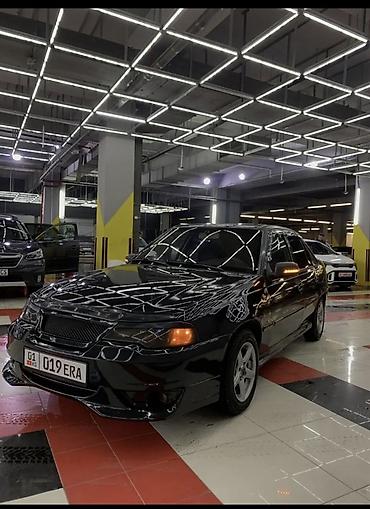 Другие автомобили: Седан черного цвета с доработанным экстерьером. Основные особенности — 6