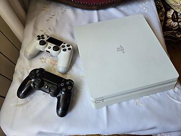 PlayStation 4 Slim (ağ rəng) 500GB İdeal vəziyyətdə, heç bir problemi