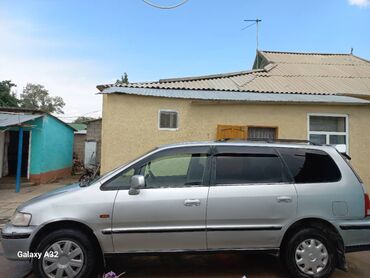 бак на атего: Минивэн Honda Odyssey серебристого цвета с вместительным салоном